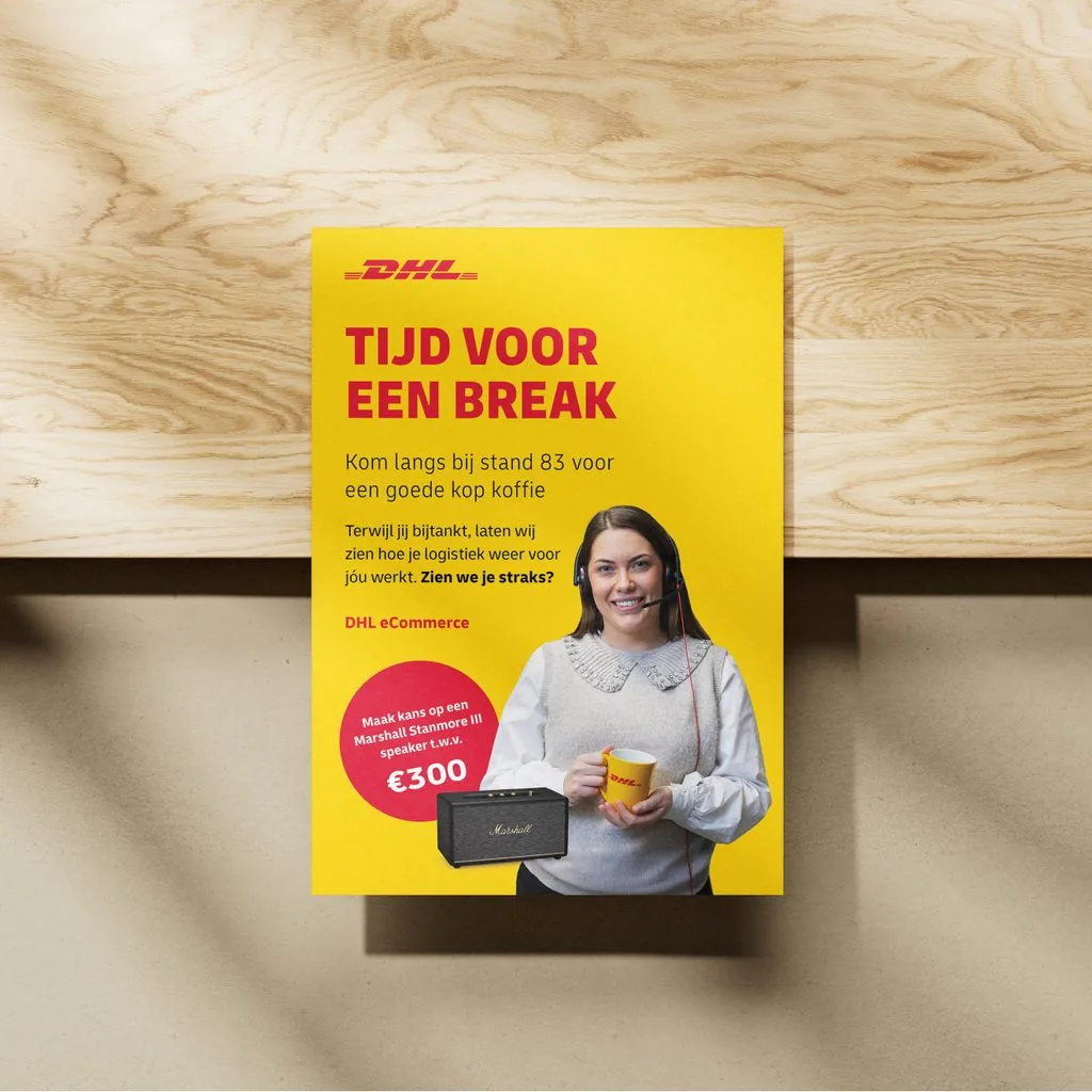 The stand flyer — “Tijd voor een break”, inviting visitors to stand 83 for a coffee